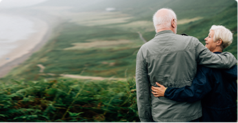 happy-senior-couple-enjoying-breathtaking-view