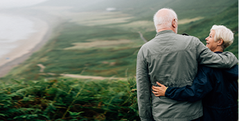 happy-senior-couple-enjoying-breathtaking-view